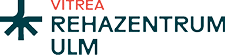 The logo features a stylized dark teal tree-like symbol with the word “VITREA" in red above the text "REHAZENTRUM ULM" in dark teal. Beschreibung von KI generiert