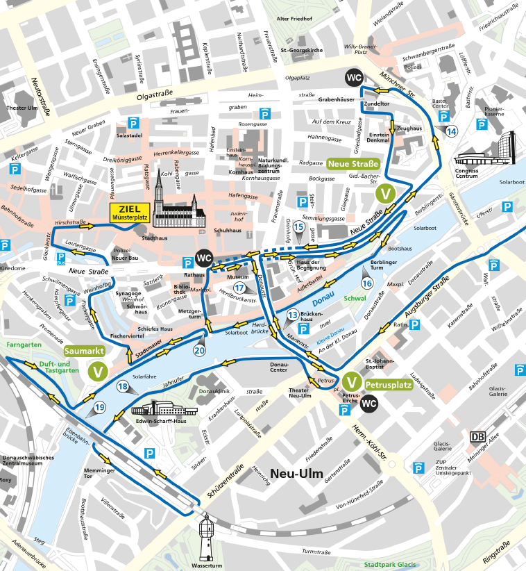 A detailed city map highlighting a route through streets and landmarks around M nsterplatz with parking areas, public restrooms, and points of interest marked. Beschreibung von KI generiert
